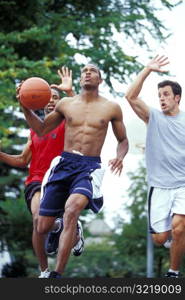 Men Playing Basketball