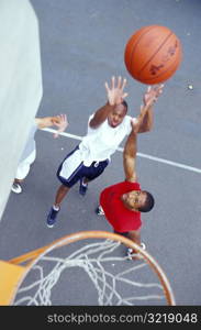 Men Playing Basketball