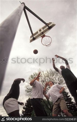 Men Playing Basketball
