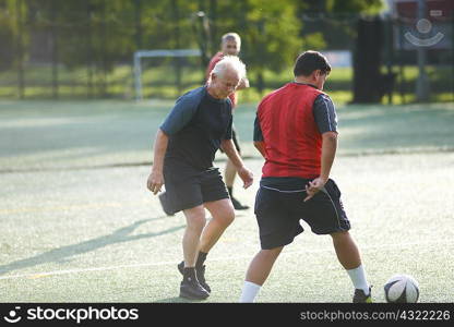 Men playing football