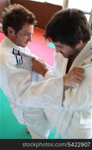 Men practicing judo