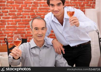 Men raising their glasses in a toast