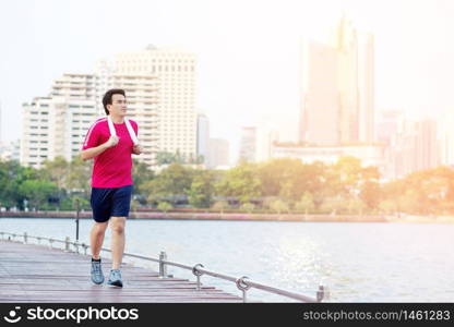 Men running around the park