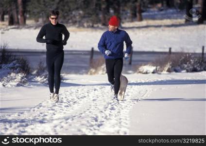 Men Running in the Snow