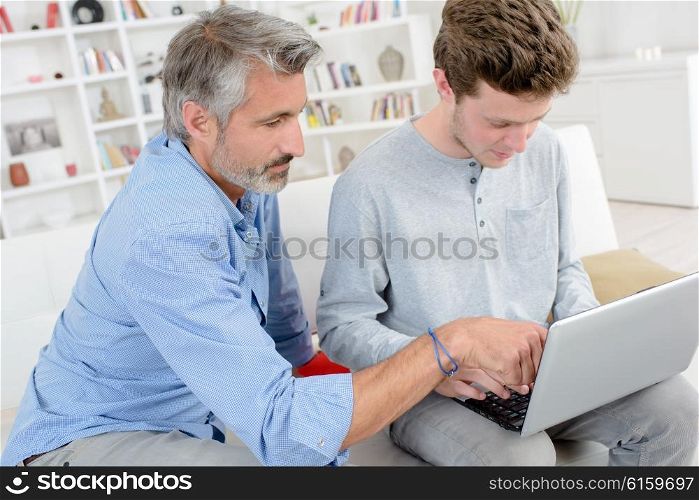 men with a laptop