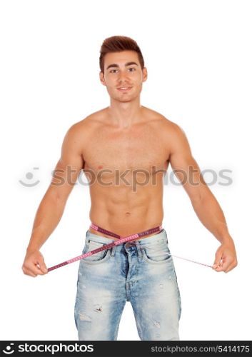 Men with perfect abs measuring his waist isolated on a white background