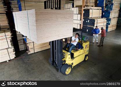 Men working in warehouse
