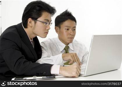 Men Working On Computer