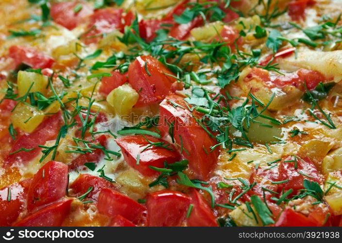 Menemen - traditional Turkish dish.includes eggs, onion, tomato, green peppers, and spices .commonly eaten for breakfast