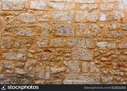 Menorca castle stonewall ashlar masonry wall texture antique in Balearic islands