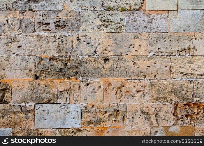Menorca castle stonewall ashlar masonry wall texture antique in Balearic islands