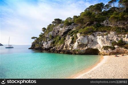 MENORCA, SPAIN - June 29, 2018: The most beautiful beach in Menorca during first hours of the day (07:00), summer season