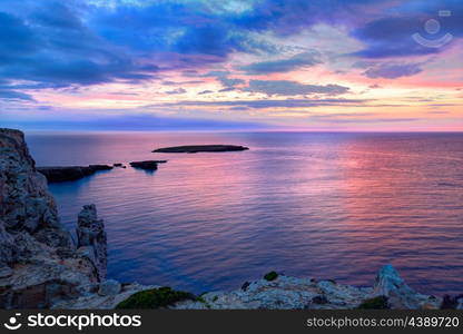 Menorca sunset in Cap de Caballeria cape at Balearic Islands es Mercadal