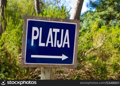 Menorca track blue sign with Platja or beach arrow in Mediterranean pine forest
