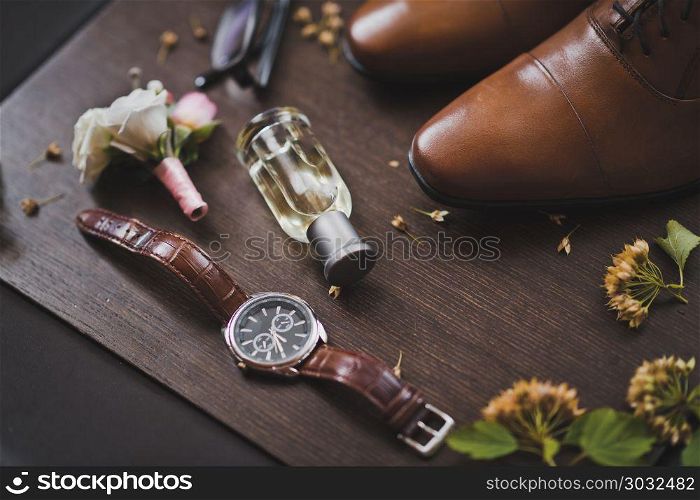 Mens accessories for daily wear.. Men glasses watches and perfume with a boots 713.. Men glasses watches and perfume with a boots 713.