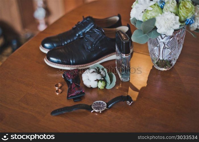 Mens accessories on the table before the wedding.. Decoration men at the ceremony 1142.. Decoration men at the ceremony 1142.