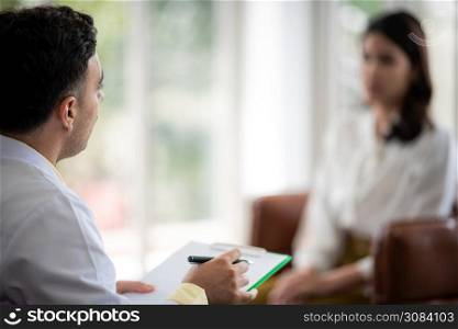 Mental health concept, Close-up of psychologist comforting his depressed patient, Doctor (psychiatrist) consultation and diagnostic examining woman patient