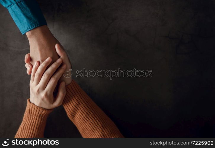 Mental Health Concept. Couple making Comfortable Hand Touch for Encouraging Together. Love and Care. Top View