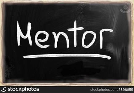""Mentor" handwritten with white chalk on a blackboard."