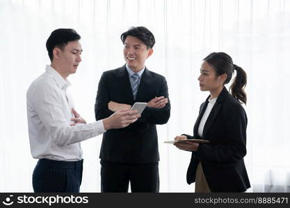 Mentor, manager advice younger colleagues in workplace. Businesspeople discussing or planning financial project strategy, talking together for harmony and strong teamwork in office concept.. Manager advice younger colleagues in workplace as concept of harmony in office.