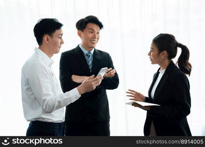 Mentor, manager advice younger colleagues in workplace. Businesspeople discussing or planning financial project strategy, talking together for harmony and strong teamwork in office concept.. Manager advice younger colleagues in workplace as concept of harmony in office.