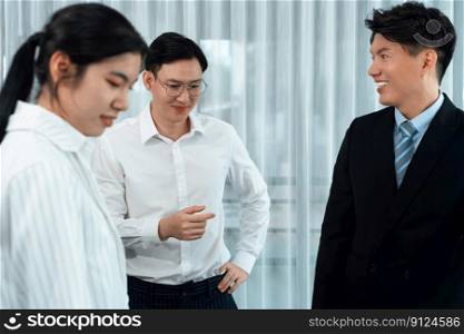 Mentor, manager advice younger colleagues in workplace. Businesspeople discussing or planning financial project strategy, talking together for harmony and strong teamwork in office concept.. Manager advice younger colleagues in workplace as concept of harmony in office.