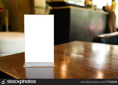 Menu frame space for text marketing promotion standing on wood table in Bar restaurant cafe