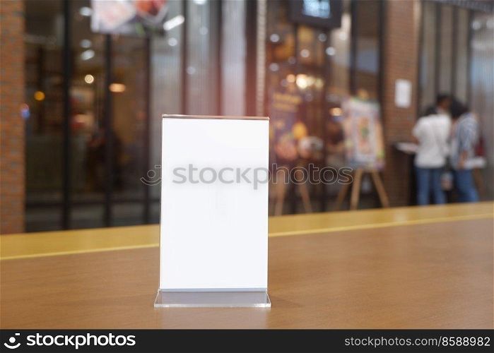 Menu frame standing on wood table in Bar restaurant cafe. space for text marketing promotion - Image