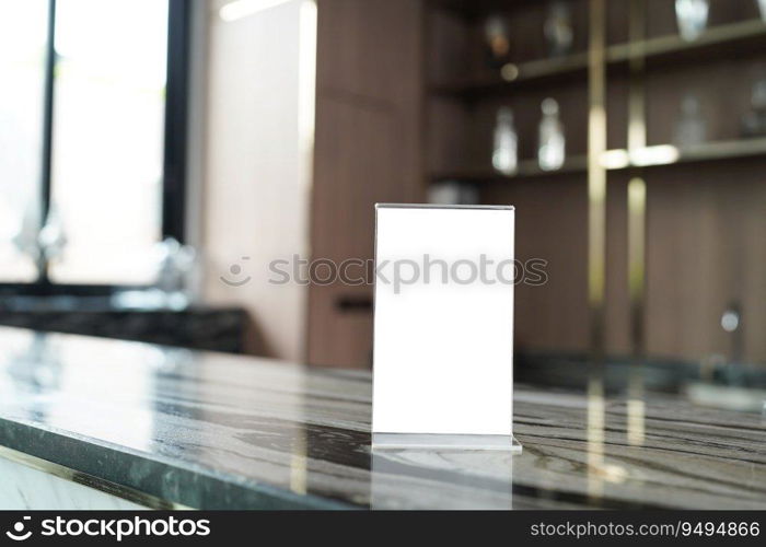 Menu mack up blank for text marketing promotion. Mock up Menu frame standing on wood table in restaurant space for text.