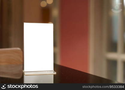 Menu mock up blank for text marketing promotion. Mock up Menu frame standing on wood table in restaurant space for text.