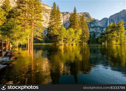 Merced River and Yosemite Falls landscape in Yosemite National Park. California, USA.