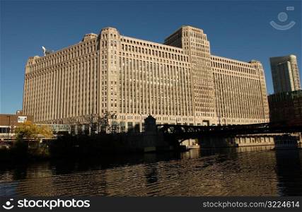 Merchandise Mart on the banks of a river in Chicago
