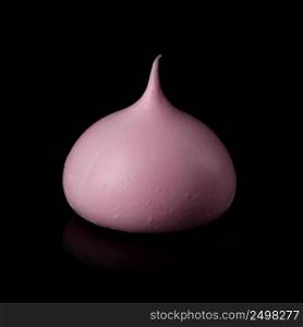 Meringue cookine pink isolated on black background with reflection.