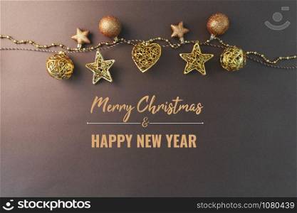 Merry Chrismas and Happy New Year, gold chrismas ball hanging on the background