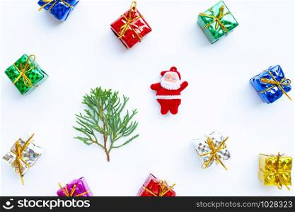 Merry Christmas and Happy Holidays, Christmas composition. gifts, pine branches and decorations on white background.