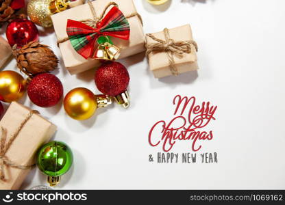 Merry Christmas and happy holidays xmas gifts. Baubles, presents, candy with christmas ornaments. Top view. Christmas family traditions on white background