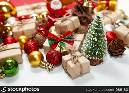 Merry Christmas and happy holidays xmas gifts. Baubles, presents, candy with christmas ornaments. Top view. Christmas family traditions on white background