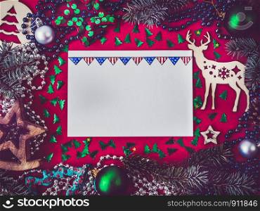 Merry Christmas and Happy New Year. Beautiful card with American flag pattern. View from above, close-up, flat lay. Congratulations to loved ones, family, relatives, friends and colleagues. Merry Christmas and Happy New Year 2020