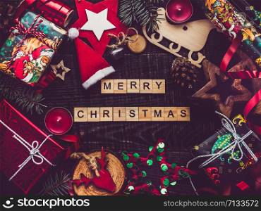 Merry Christmas and Happy New Year. Beautiful card with Christmas decorations. View from above, close-up, flat lay. Congratulations to loved ones, family, relatives, friends and colleagues. Merry Christmas. Happy New Year. Beautiful card