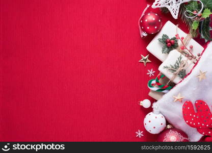 Merry Christmas and Happy New Year decoration for celebration on red cloth background with copy space.