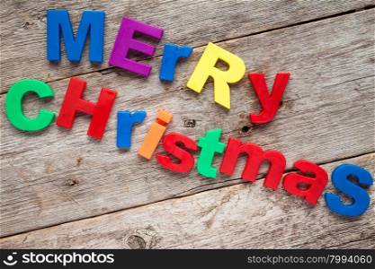 Merry Christmas message written in a colorful plastic letters