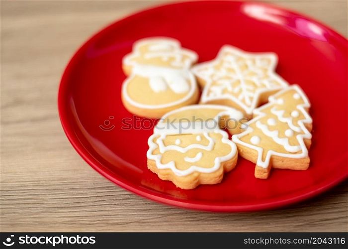 Merry Christmas with homemade cookies on wood table background. Xmas, party, holiday and happy New Year concept