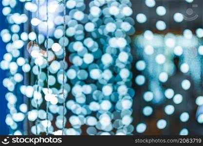 Merry x-mas,White Colorful light Abstract circular bokeh of Christmas tree background Decoration During Christmas and New Year.