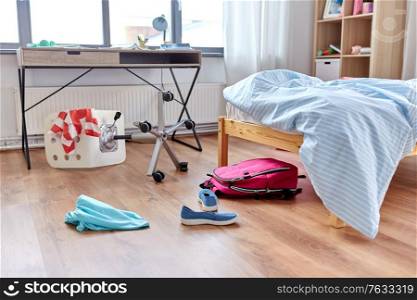 mess, disorder and interior concept - view of messy home kid&rsquo;s room with scattered stuff. messy home or kid&rsquo;s room with scattered stuff