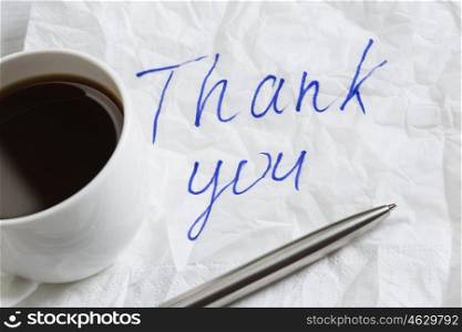 Message written on napkin. Romantic message written on napkin and cup of coffee on wooden table