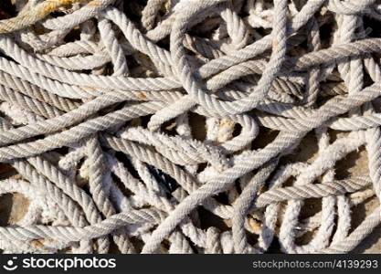 messy braided ropes of fishing tackle equipment