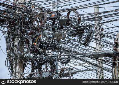 messy electrical cables on post