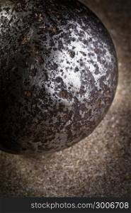 metal ball on the marble close up