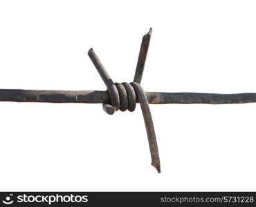 Metal barbed wire close up against the sky