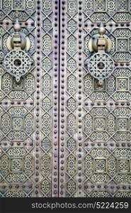 metal brown morocco in africa the old wood facade home and rusty safe padlock